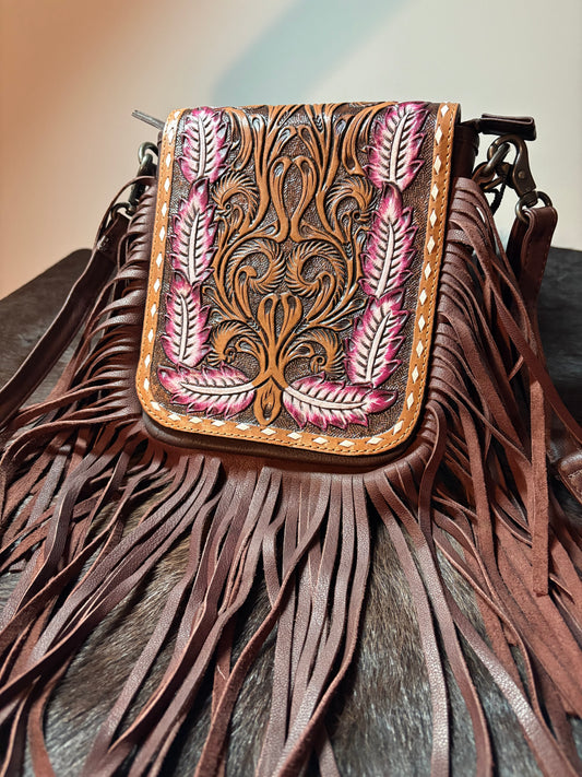 Tooled leather cross body bag